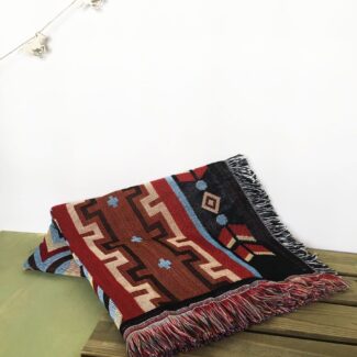 Manta con print de motivos nativo americanos