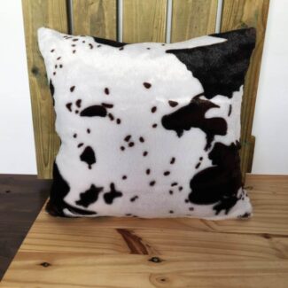 Cojín con Print de Vaca Cozy Lodge