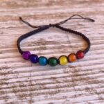 Pulsera Chakra trenzada con siete bolitas de cristal