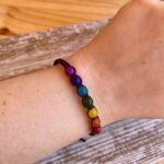 Pulsera Chakra trenzada con siete bolitas de cristal