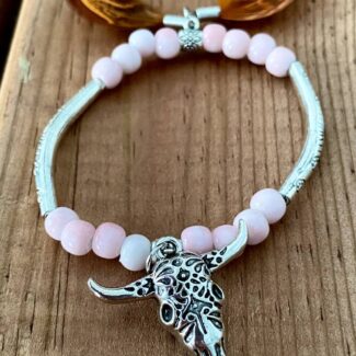 Pulsera Cráneo de búfalo y plumas El Álamo Rosa